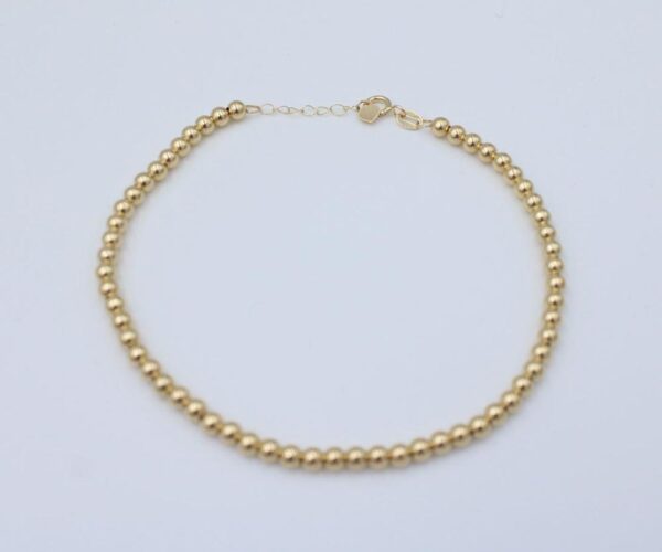 18 karat solid gold bead necklace and bracelet set