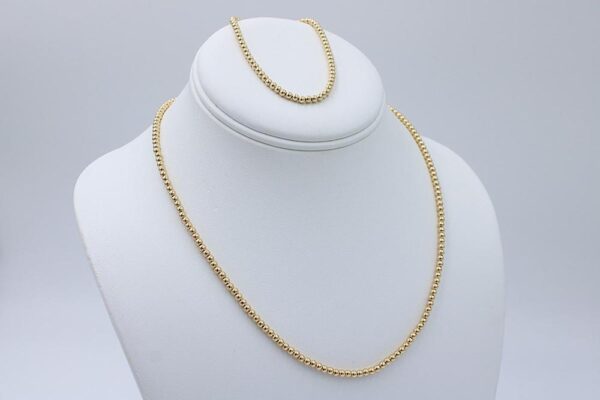 18 karat solid gold bead necklace and bracelet set