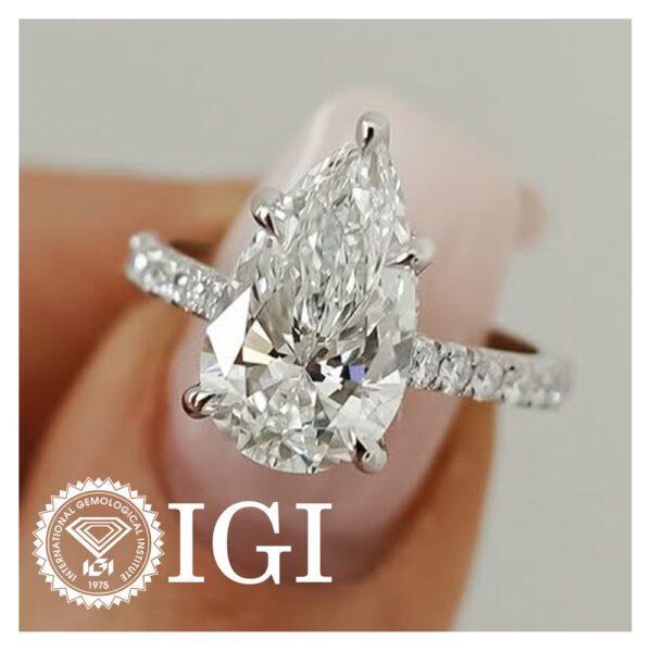 Pear Shaped Diamond Ring With Pave Band
