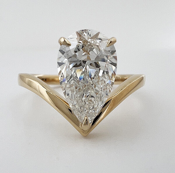 V band pear diamond engagement ring
