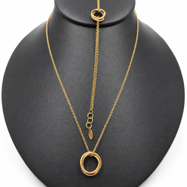 18k trinity bracelet and necklace