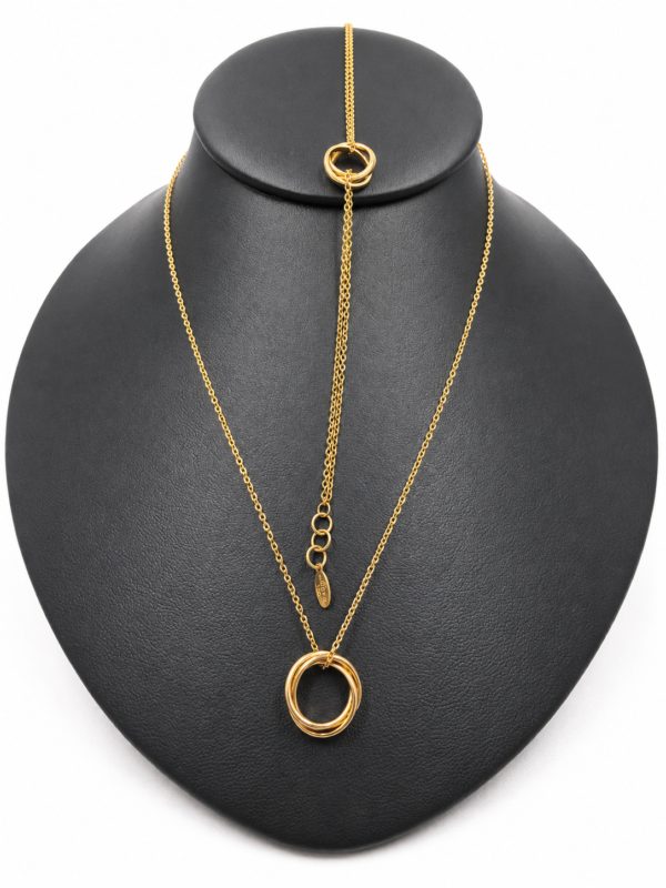 18k trinity bracelet and necklace