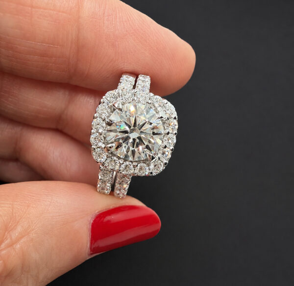 cushion-halo-engagement-ring-with-wedding-band
