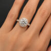 round-halo-engagement-ring-with-pavé-band