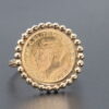 18k-ring-with-21k-coin